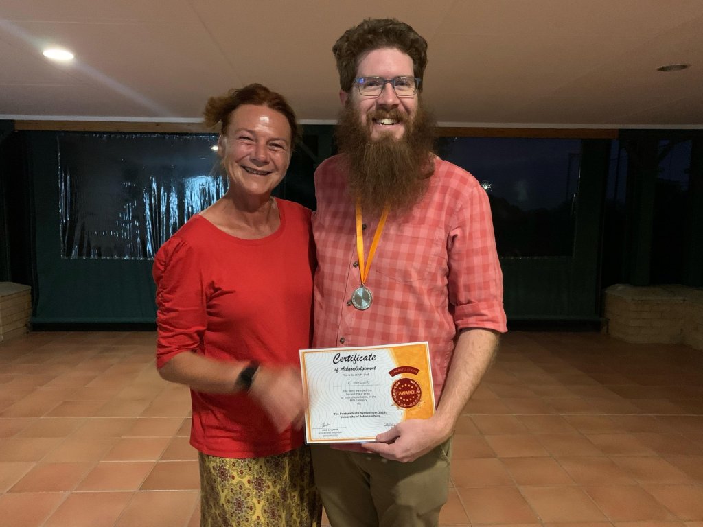 Ross receiving a prize at the 2023 University of Johannesburg Botany&nbsp;Symposium